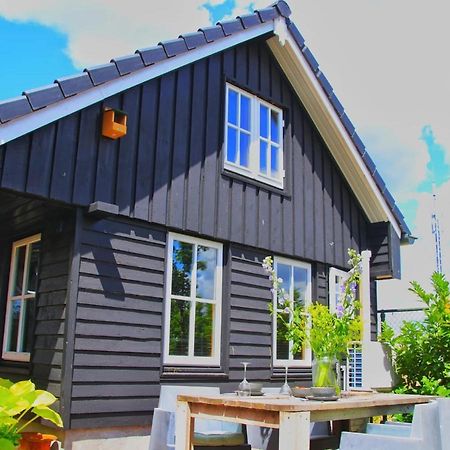 Uniek houten huis nabij bos en plassen Hollandsche Rading Buitenkant foto