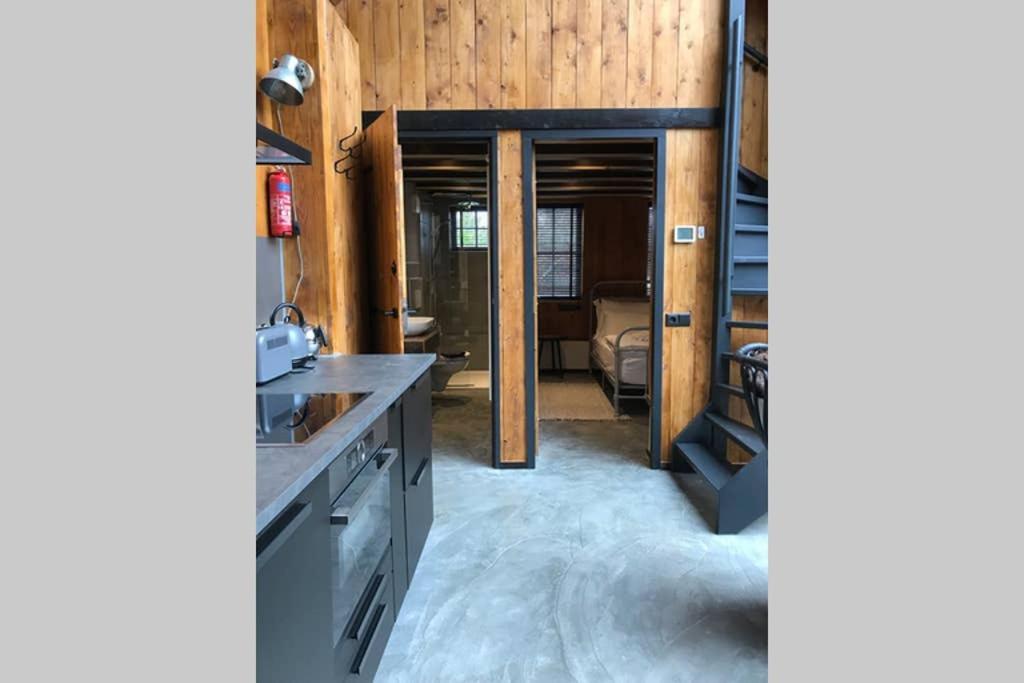 Uniek houten huis nabij bos en plassen Hollandsche Rading Buitenkant foto