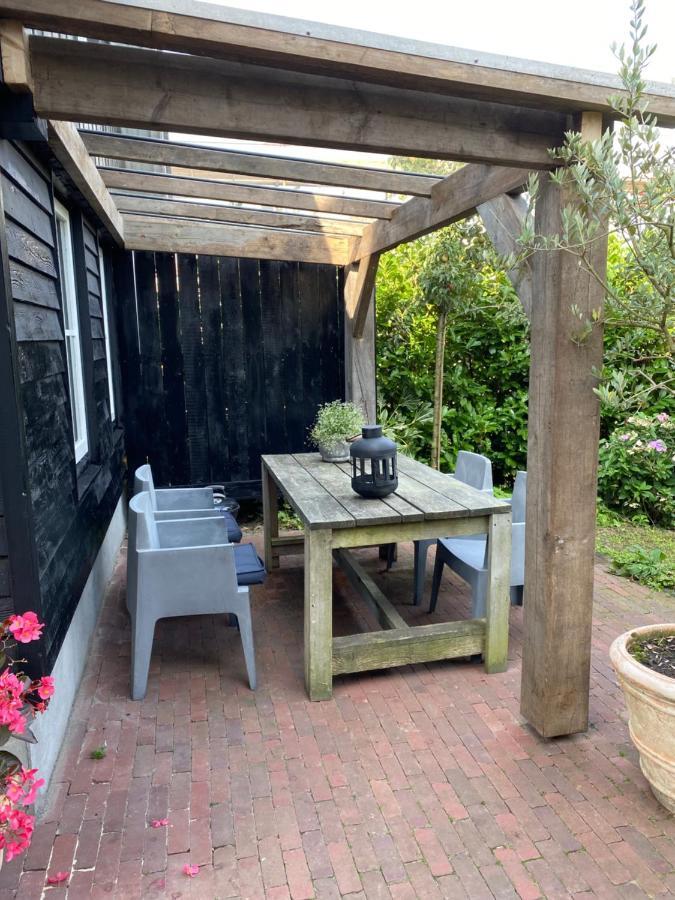 Uniek houten huis nabij bos en plassen Hollandsche Rading Buitenkant foto