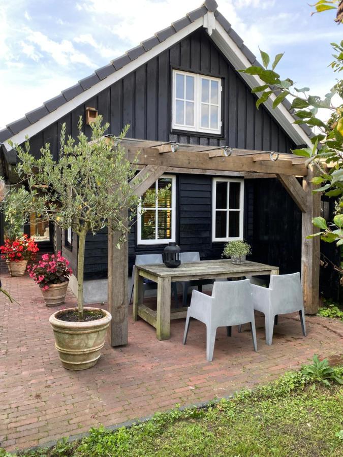 Uniek houten huis nabij bos en plassen Hollandsche Rading Buitenkant foto